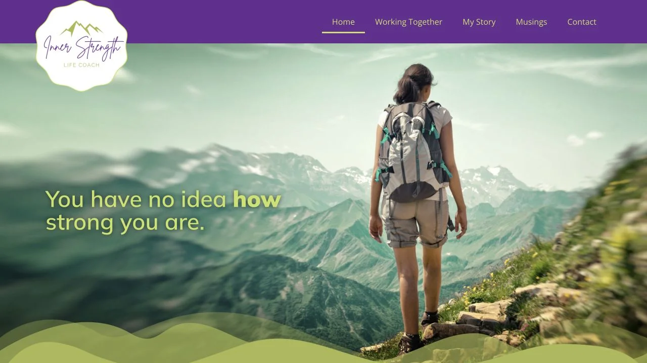 Inner Strength Life Coach’s website, with a mountain hiking scene and the message You have no idea how strong you are